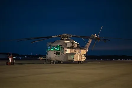 CH-53K helicopter on the flight line at night